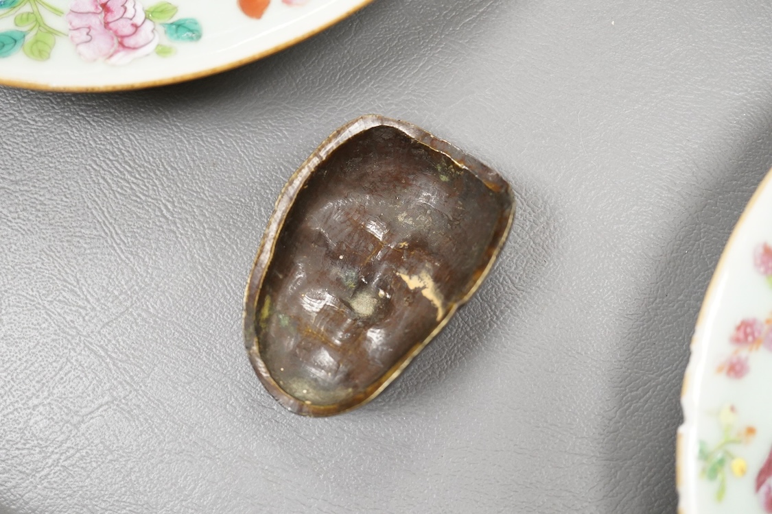 A Japanese bronze mask and four famille rose dishes - largest 29cm